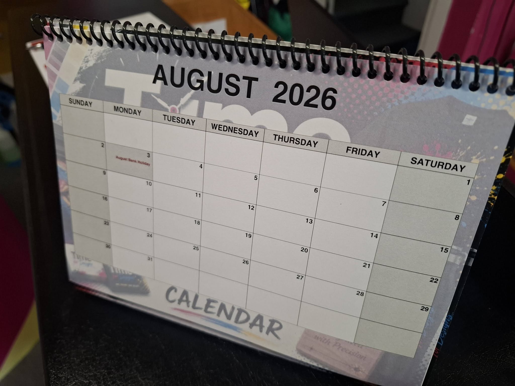 Monthly pages inside a personalised wire-bound desk calendar