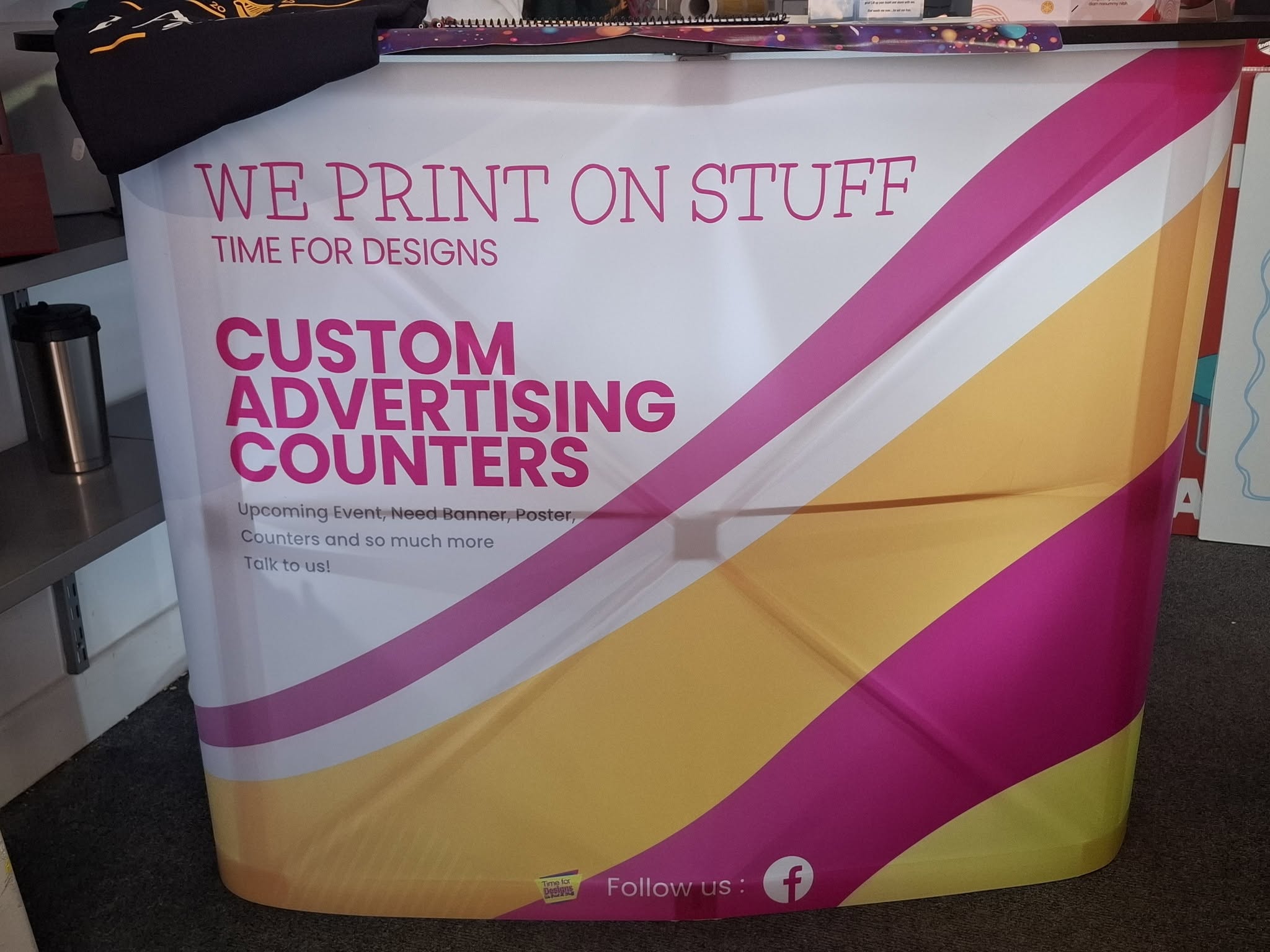 Time for Designs branded advertising counter with a changeable printed graphic