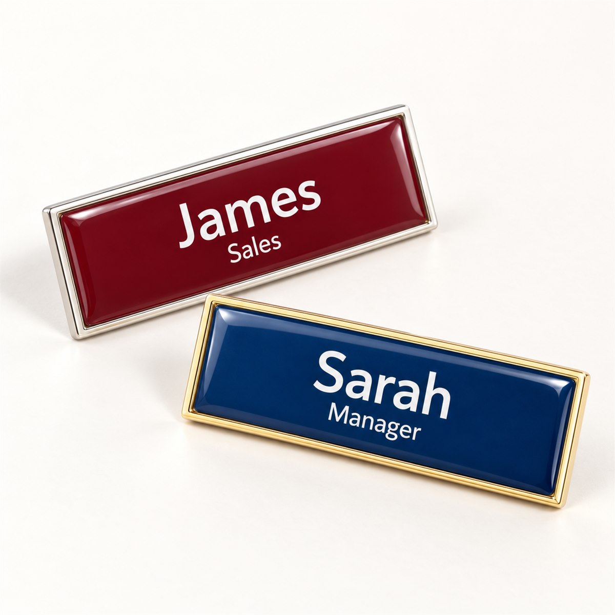 Rectangular domed personalised name badges in gold-coloured and silver frames