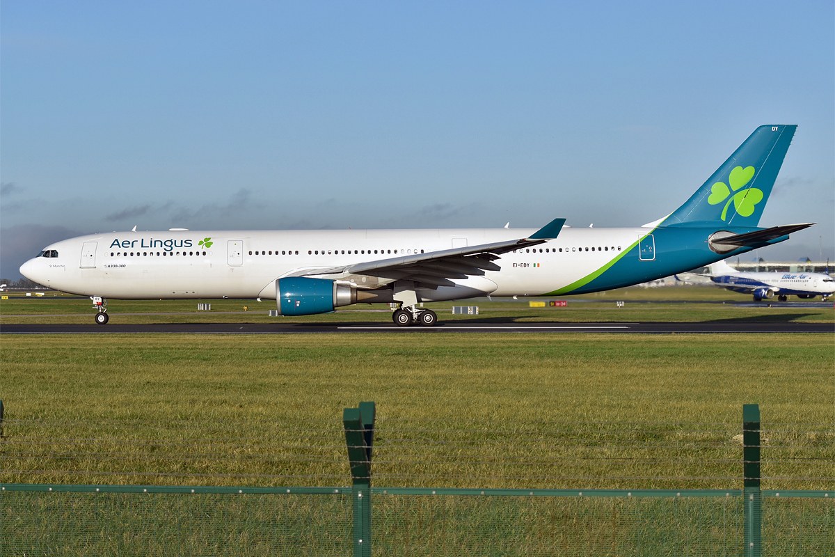 Aer Lingus Airbus A330 EI-EDY in its white-and-teal livery, with the tilted shamrock on the tail.