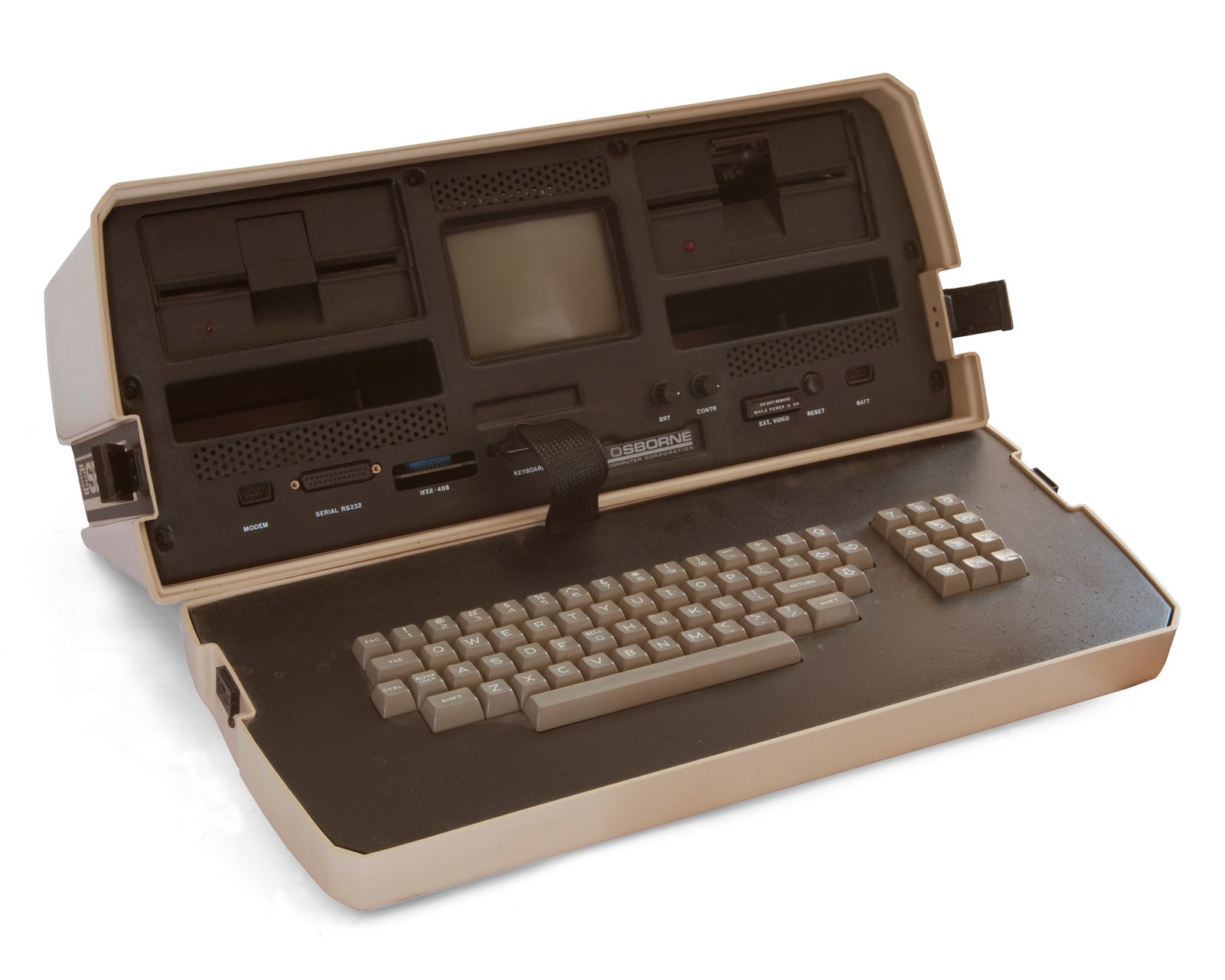An early Osborne 1 with its small screen, twin disk drives and detachable keyboard.