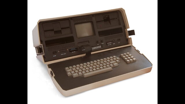 An early Osborne 1 with its small screen, twin disk drives and detachable keyboard.