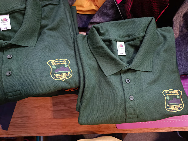Green polo shirts branded for St. Patrick’s Brass Band in Cashel
